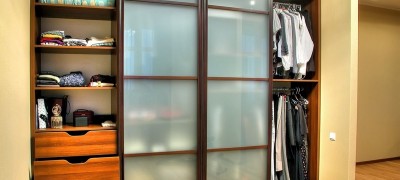 Sliding door systems for wardrobes