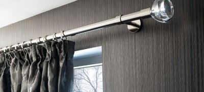 How to install a curtain rod on a ceiling or wall