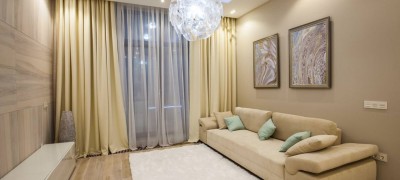 Curtains in a modern style in the interior of the living room