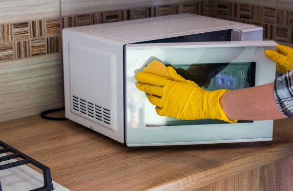 The most suitable option for cleaning a microwave oven at home is given in the user manual.