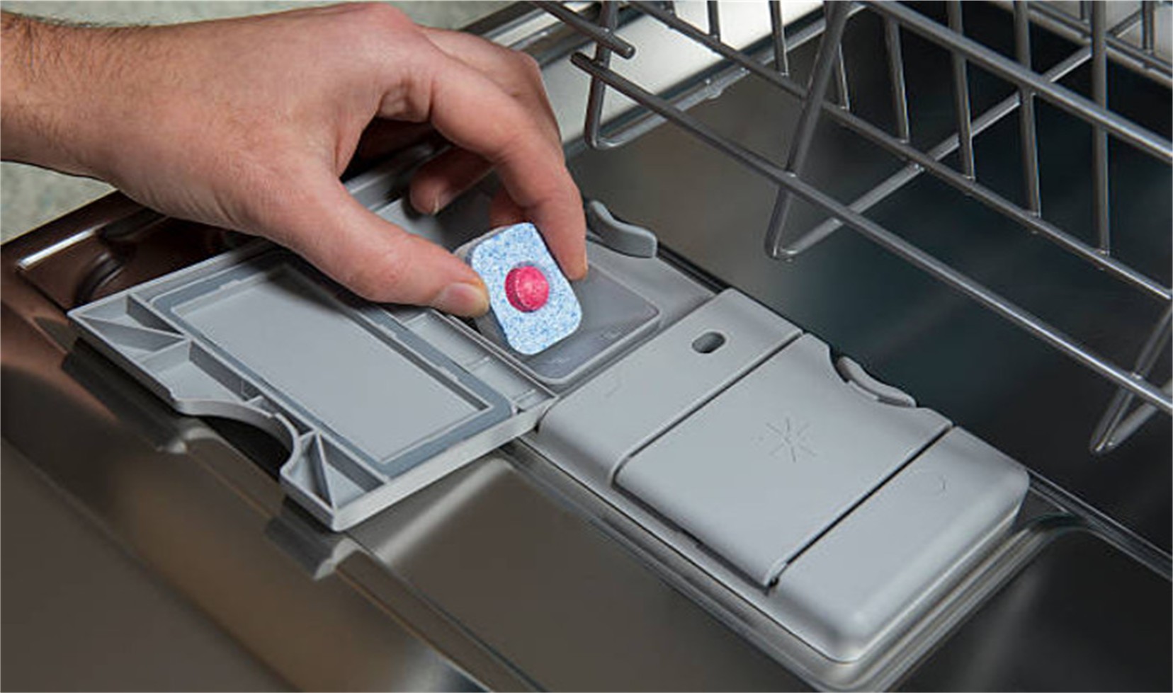 where to put the tablets in the dishwasher