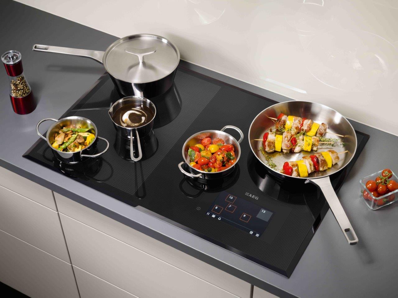 dishes with food on an induction hob