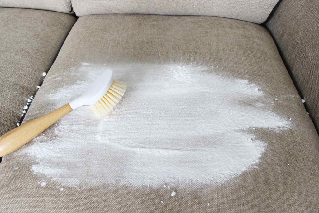 cleaning the sofa with salt