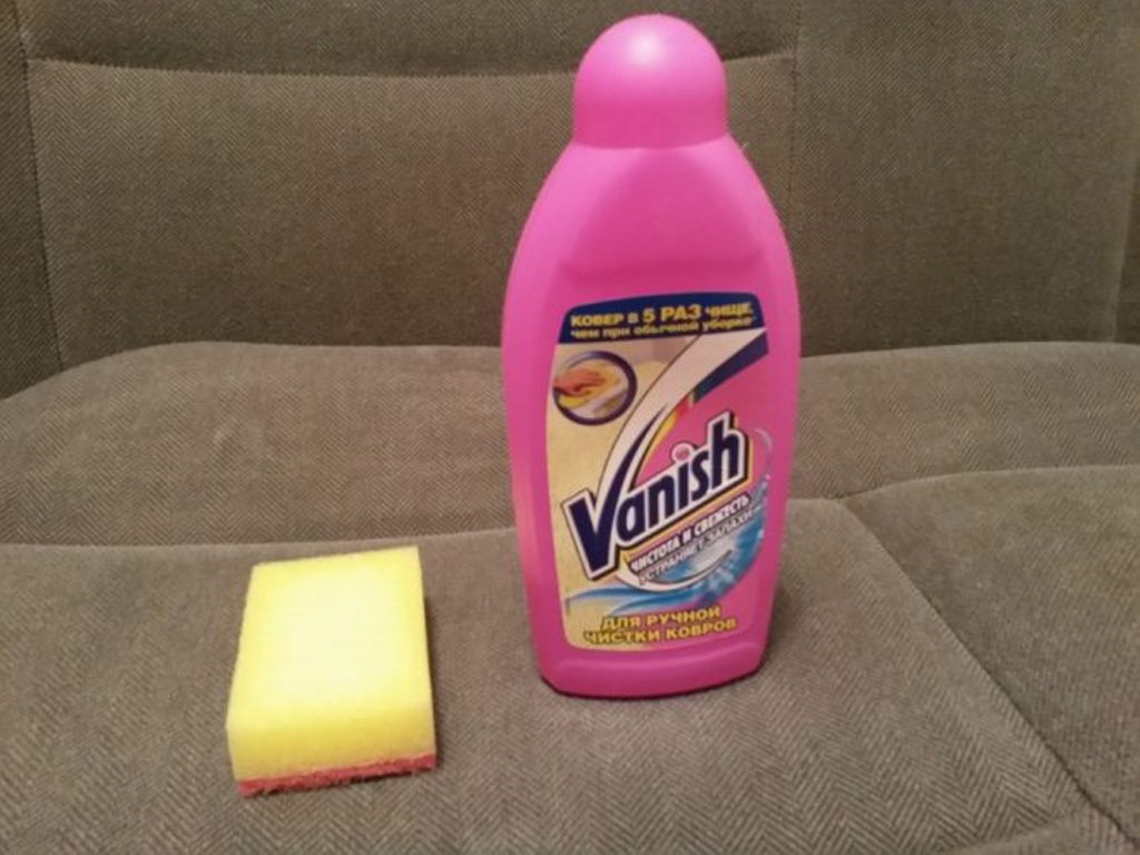 cleaning the sofa with vanish