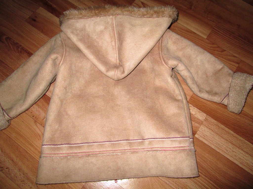 cleaning the sheepskin coat with soapy water