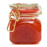 red caviar in a glass jar photo