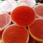 red caviar in buckets