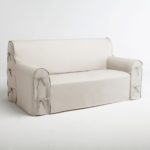 white sofa cover with strings