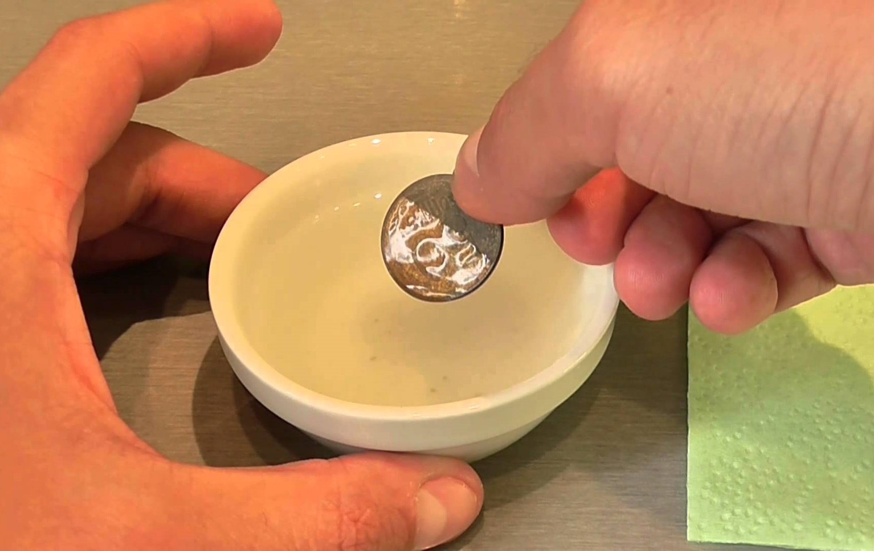 cleaning coins with oil