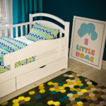 children's beds with bumpers from 2 years old photo