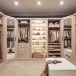 large dressing room with shelves for shoes