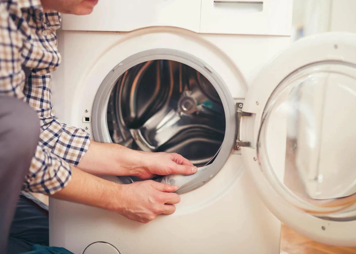 how to get rid of the smell in the washing machine