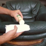 how to remove brilliant green from leather surfaces