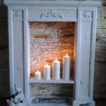 fireplace made of cardboard with candles