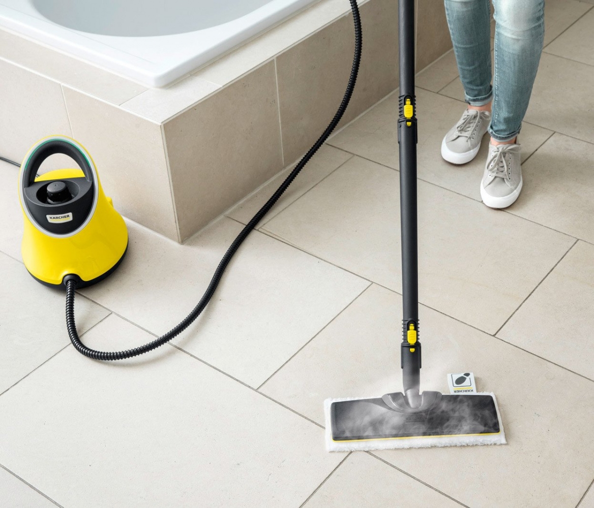 cleaning tiles with a mop