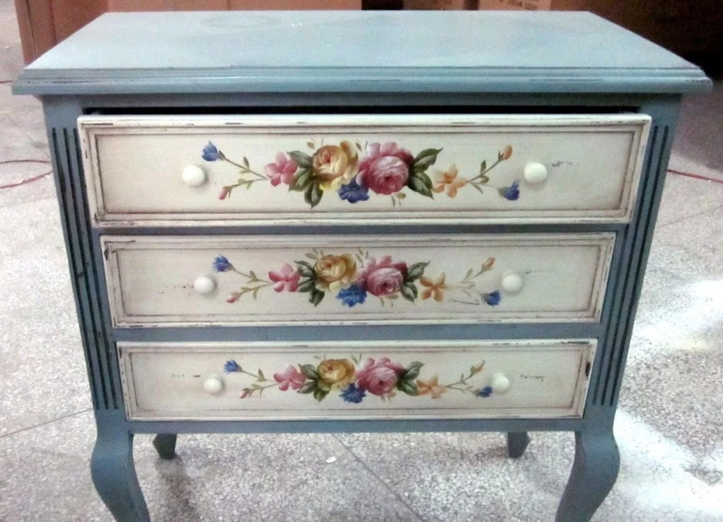 dresser in vintage style with painting