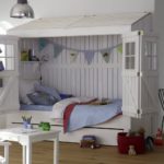 bed-house for children with flags