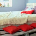 pallet bed with shaggy bedspread