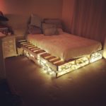 podium bed with light bulbs