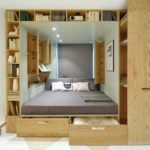 podium bed with bookcases