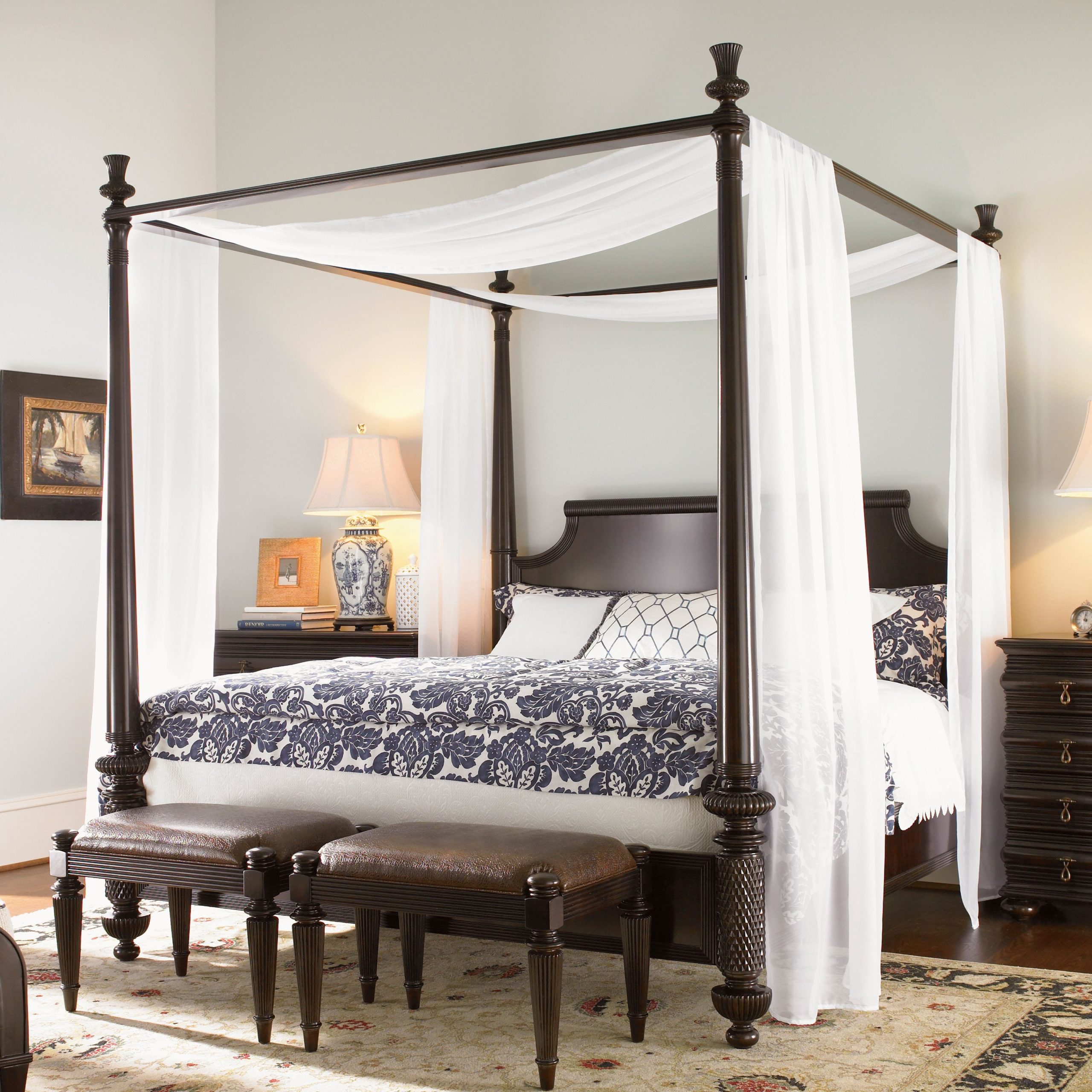 canopy bed with brown supports