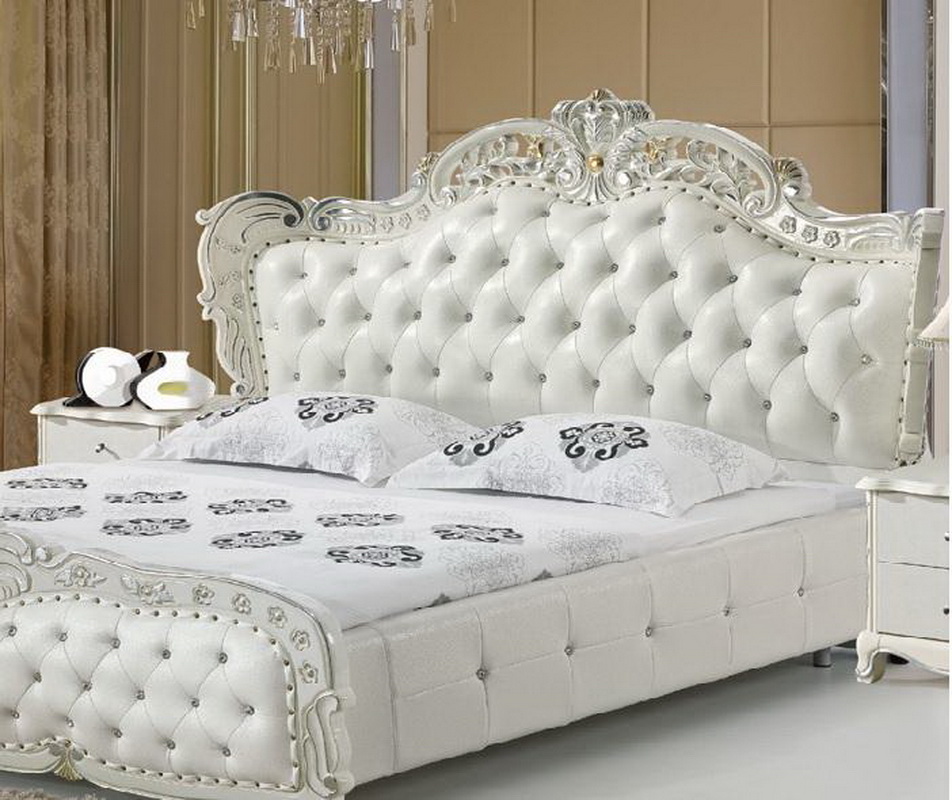 bed with a soft headboard and rhinestones