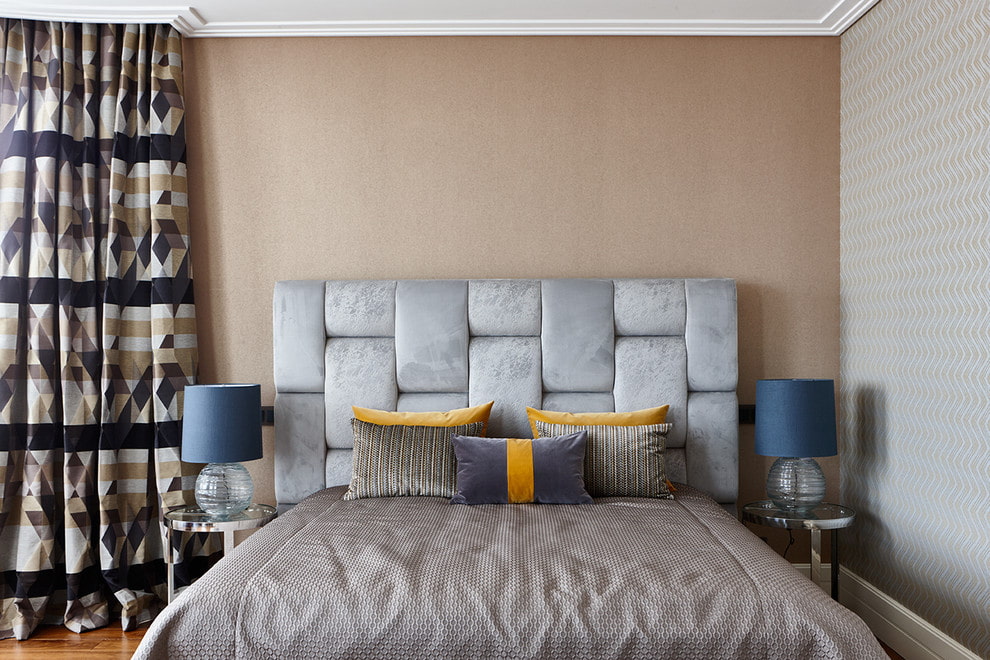 bed with a soft rectangular headboard