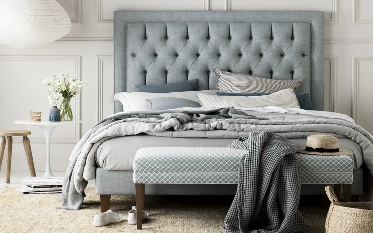 bed with a soft headboard