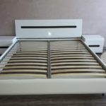 bed with lifting mechanism without mattress