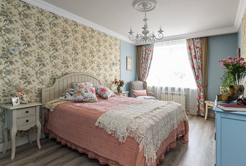 bed with pull-out cabinets in the interior of Provence