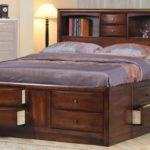 dark bed with drawers