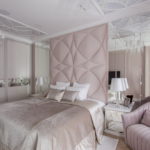 beds with a soft headboard in the bedroom