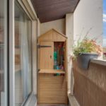 wardrobe on the balcony with a house