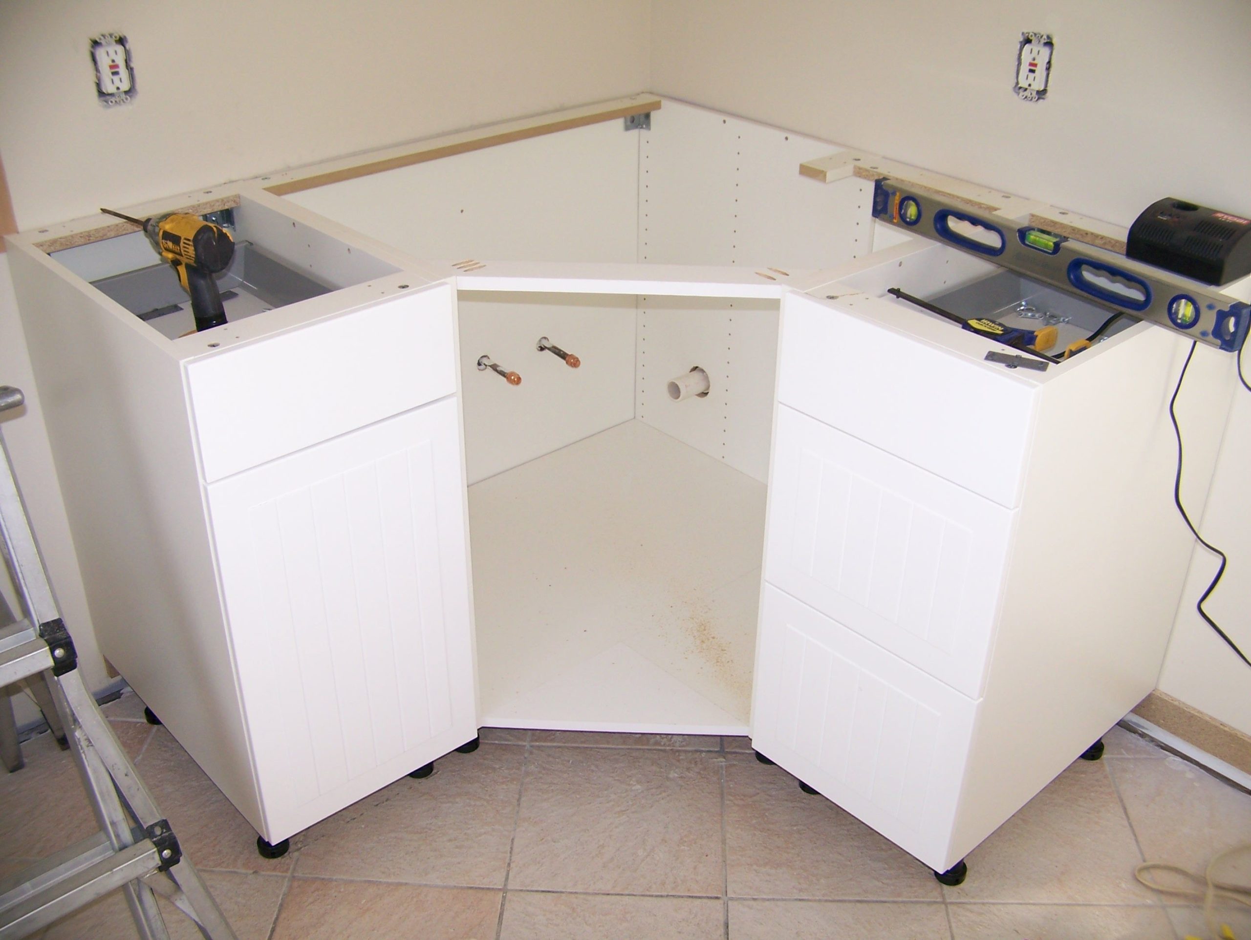 installation of a cabinet under a sink