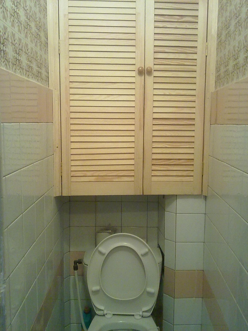 wardrobe in the toilet made of wood