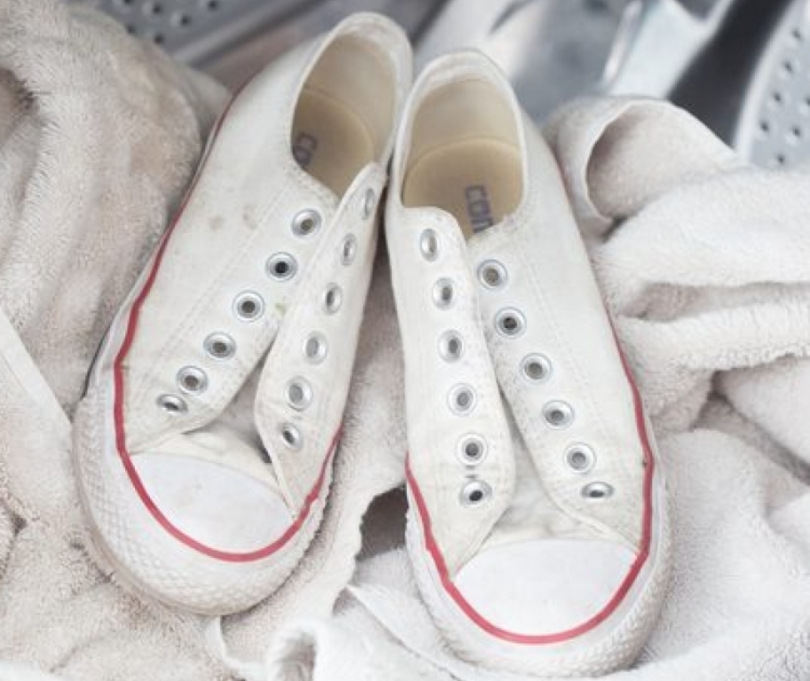 washing sneakers in a typewriter photo