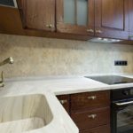 white table top with brown pedestals