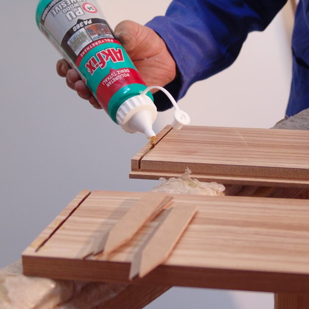 gluing wooden chair