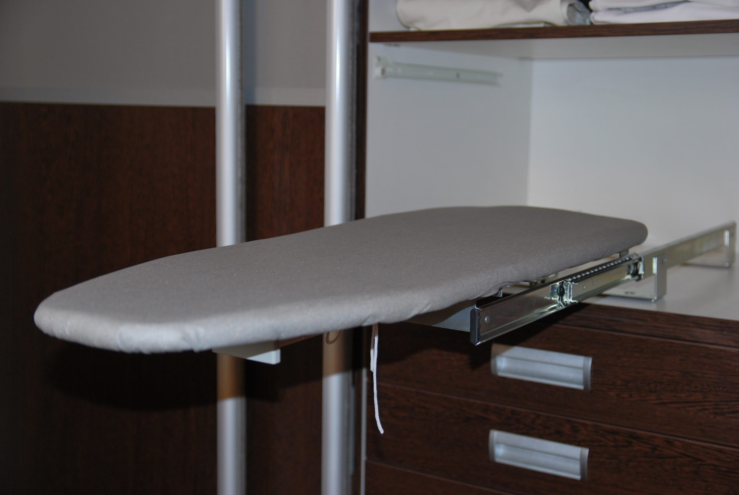 ironing board built into the wardrobe