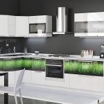 white kitchen set with grass