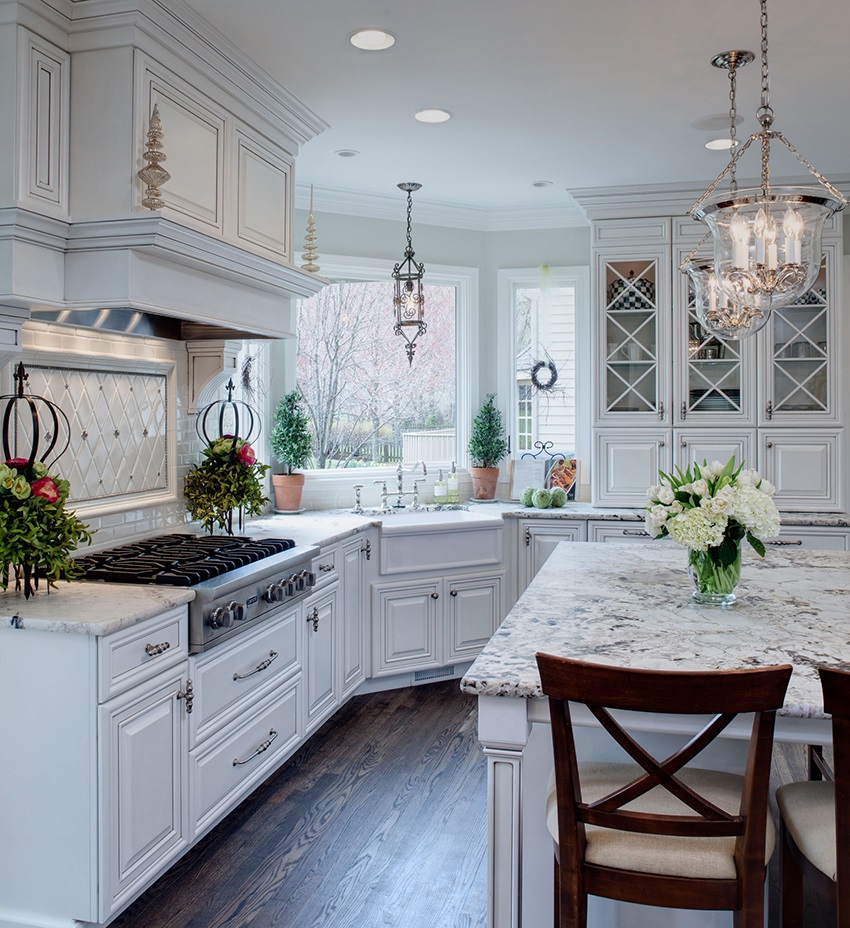 flowers in pots in a white kitchen