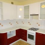 white kitchen set with red