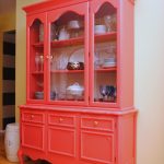 red sideboard with dishes