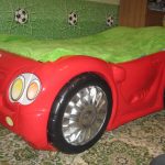 baby car bed with green mattress