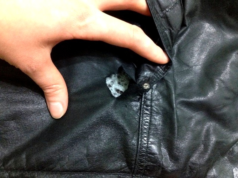 hole in leather jacket