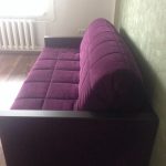 purple sofa in the apartment