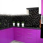 purple kitchen set with black tiles