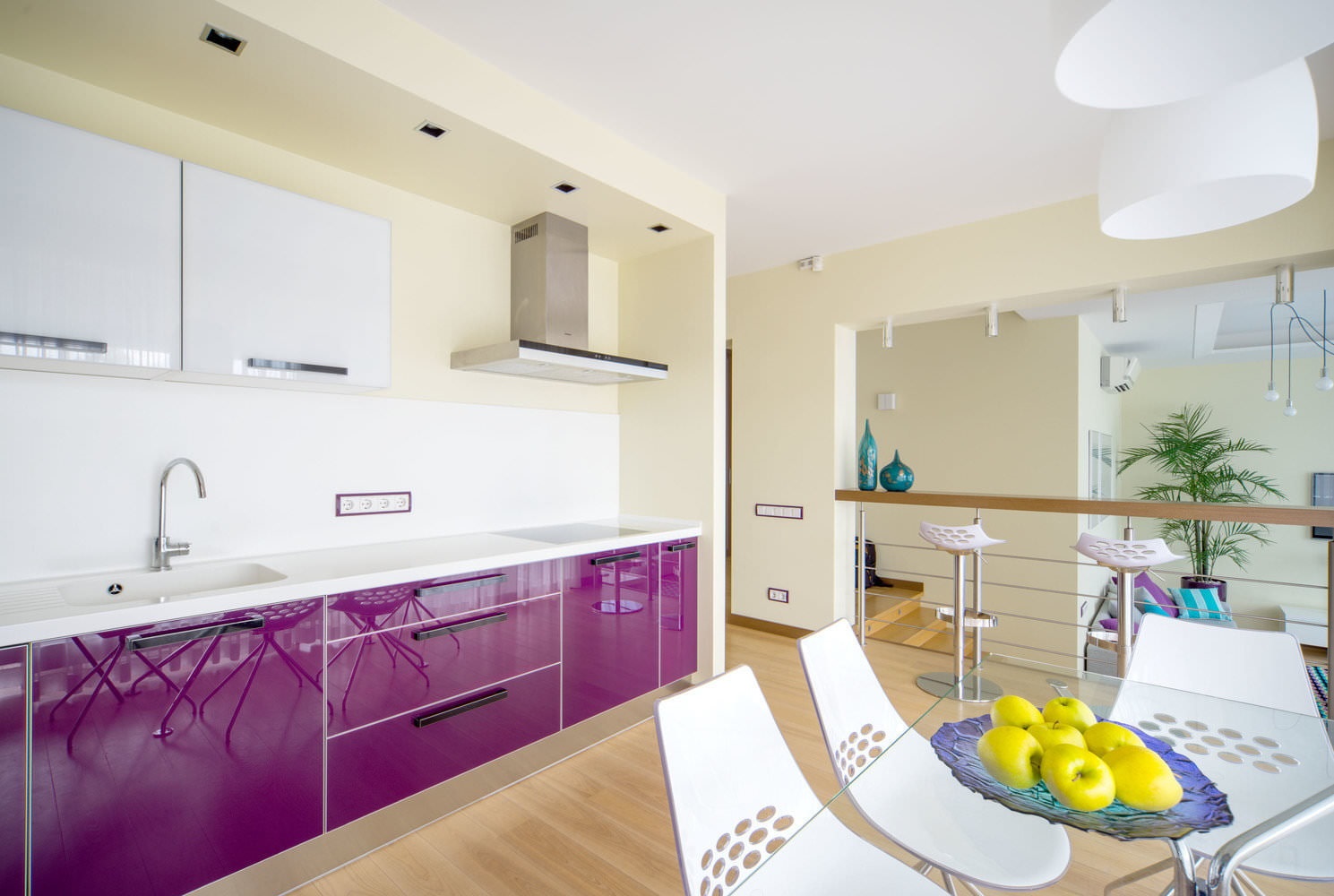 glass table in purple kitchen