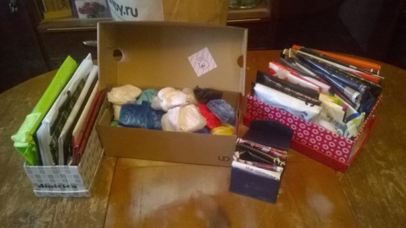 storing bags in the kitchen in a box