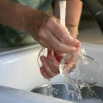 washing crystal under the tap